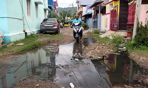 Sub-standard roads filled with drainage water have made life difficult for residents of Vasantham Nagar Extension