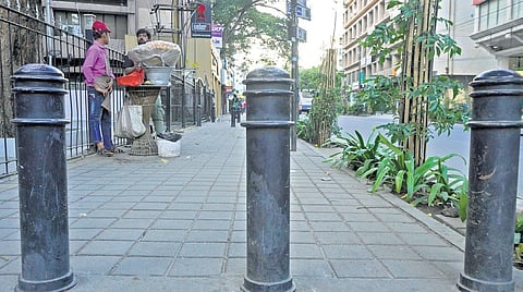 Bollards and vendors on footpaths hinder movement of specially-abled persons, especially those on wheelchairs 
