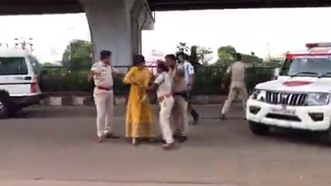 Allegedly peeved over getting stuck in the traffic due to the blockade for CM’s movement, the woman went past the security cordon and walked to the middle of the road at Rasulgarh square causing a flutter.
