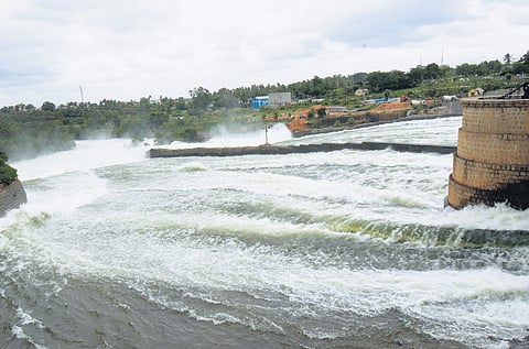 Over 35,000 cusecs of water of River Cauvery being released from the crest gates of the KRS reservoir, following heavy rain, on Sunday 