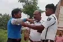 After a social media video of a traffic cop slapping and abusing a lorry driver in Quthbullapur went viral.