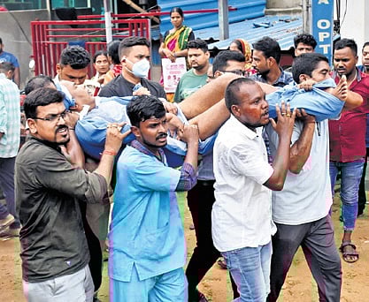 Patients being evacuated from the Radha Raman Hospital after fire broke out on Saturday