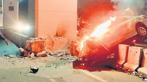 The vehicle catches fire, trapping the Class 12 student inside