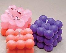 candles in different shapes, colours, fragrances, and sizes arein Carelyn's store