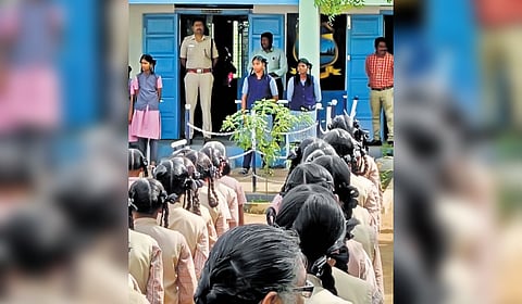 Dr V Prassanna Kumar, ASP, addressing students at the government higher secondary school 