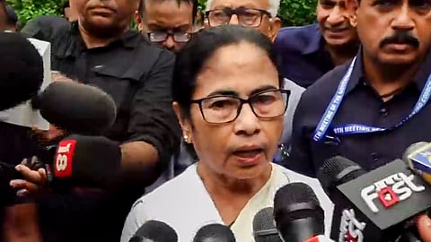 West Bengal Chief Minister Mamata Banerjee interacts with the media after walking out of a Niti Aayog meeting chaired by Prime Minister Narendra Modi, in New Delhi.