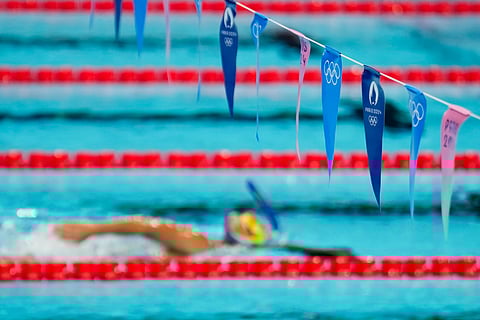 A swimmer trains at La Defense Arena ahead of the 2024 Summer Olympics, Wednesday, July 24, 2024, in Paris, France.
