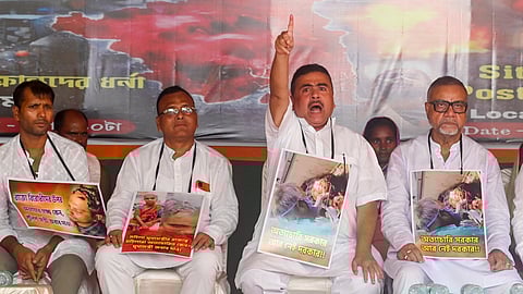 Leader of Opposition in West Bengal Assembly and BJP leader Suvendu Adhikari (2R) with party leaders during a protest against the alleged violence in the state following general elections, near Raj Bhavan, in Kolkata, Sunday, July 14, 2024.