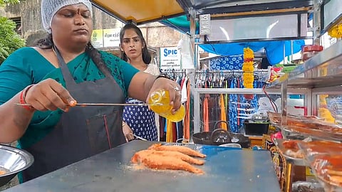 Pragathi Priya and other transwomen preparing items for customers at their food cart