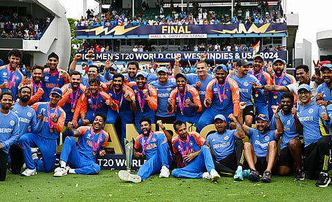 Team India celebrates with the trophy after winning the ICC men's Twenty20 World Cup 2024 final cricket match between India and South Africa at Kensington Oval in Bridgetown, Barbados, on June 29, 2024.