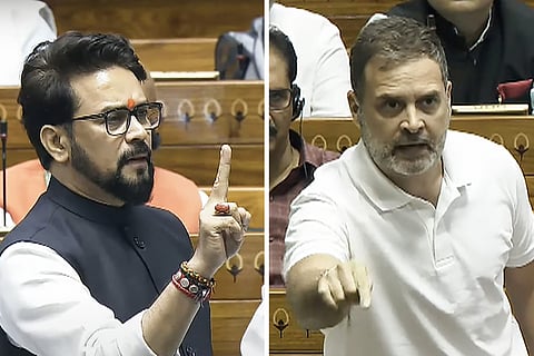 Leader of Opposition in Lok Sabha and Congress MP Rahul Gandhi (R) and BJP MP Anurag Thakur in the House during the Monsoon session of Parliament