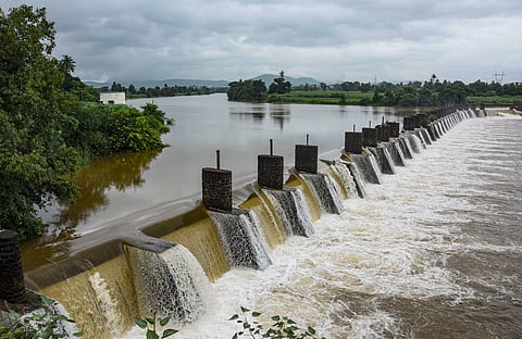 Krishna river overflows at Khodshi dam after heavy monsoon rains, in Maharashtra's Karad, Monday, July 22, 2024.