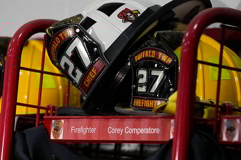 Helmets rest on the locker of firefighter Corey Comperatore at the Buffalo Township Fire Company 27 in Buffalo Township. He was killed during a shooting at a campaign rally for Republican presidential candidate former President Donald Trump