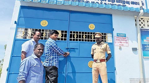 The de-addiction centre near Tirukoilur being sealed by revenue department officials in the presence of police.