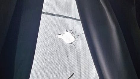 Firing incident in Narsingi, a bullet pierced through the window of an apartment