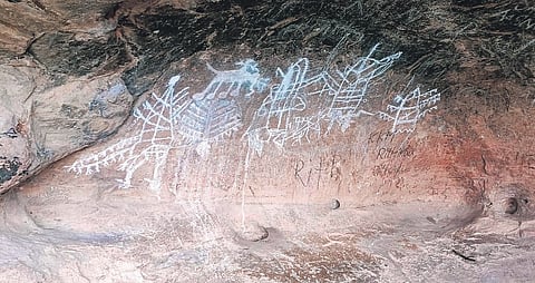Ancient rock paintings at the foothills of Kumittipathi Hills, Coimbatore