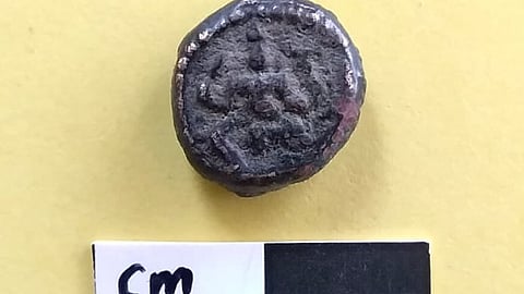 The 16th-century copper coin that was unearthed during the third phase of the Vembakottai excavation recently 