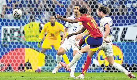 Spain’s Lamine Yamal 
scores his team’s first 
goal  against France in 
the Euro semifinal