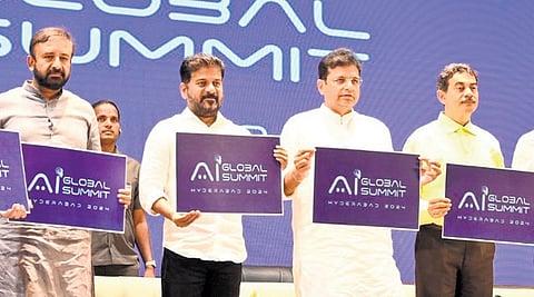 Chief Minister A Revanth Reddy unveiling the logo of global AI summit at HICC in Hyderabad on Saturday