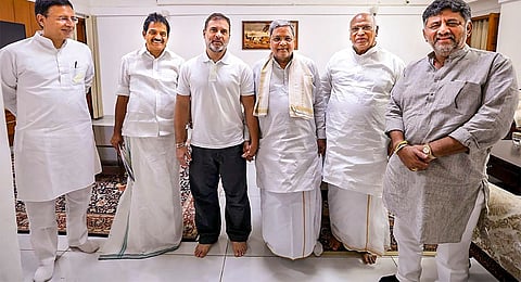 CM Siddaramaiah and DCM DK Shivakumar with AICC president Mallikarjun Kharge, Leader of Opposition in Lok Sabha Rahul Gandhi, party in-charge of Karnataka Randeep Singh Surjewala and MP KC Venugopal in New Delhi on Tuesday 