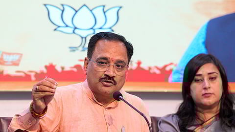 Delhi BJP President Virendra Sachdeva along with party MP Bansuri Swaraj addresses a press conference, in New Delhi.
