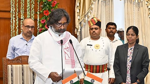 Jharkhand Mukti Morcha (JMM) leader Hemant Soren takes the oath of office and secrecy as the 13th Chief Minister of Jharkhand during the swearing-in Ceremony at the Raj Bhavan, in Ranchi.