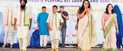 Indian sportspersons dressed in outfits designed by Tarun Tahiliani’s brand at the official ceremonial dress event