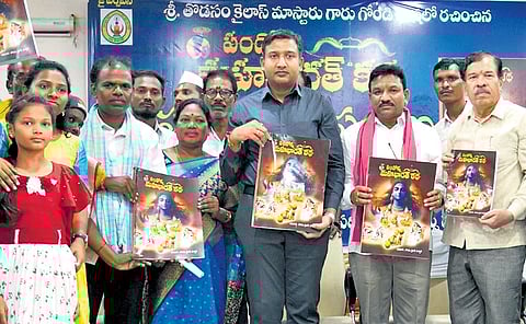 Adilabad collector Rajarshi Shah releases Pandak Na Mahabharat Katha, translated from Telugu into Gondi language by Thodasam Kailash, a government teacher, on Sunday