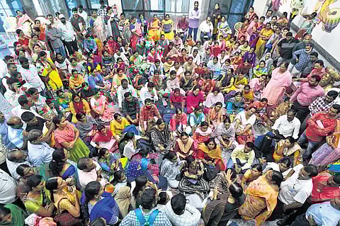 Hundreds of Gurukul teachers protest over staff relocations and schedule changes at Banjara Bhavan in Hyderabad on Tuesday