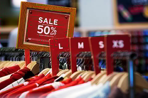 A sale sign is displayed on a rack of clothes at a store in Chicago, Monday, June 10, 2024. On Thursday, July 11, 2024, the Labor Department issues its report on inflation at the consumer level in June.