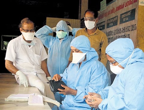 Staff at a hospital in Perambra in Kozhikode, Kerala, during the Nipah virus outbreak in 2018 