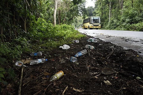 Banned plastics and liquor bottles can be seen on the Mettupalayam - Connor Hill road in Coimbatore district. 