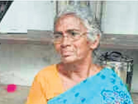 Melhi, the mother of Joy, who went missing in Amayizhanchan canal.