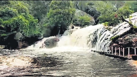 Flooding at Panchalinga Falls of the Thirumoorthy Dam
