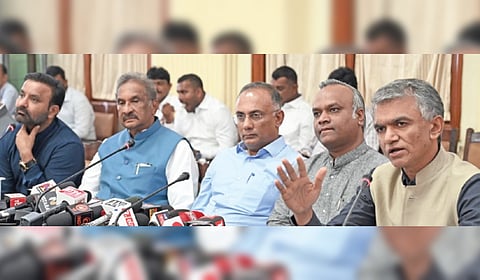 (From left) Ministers Santosh Lad, KJ George, Dinesh Gundu Rao, Priyank Kharge and Krishna Byre Gowda address the media in Bengaluru on Thursday.