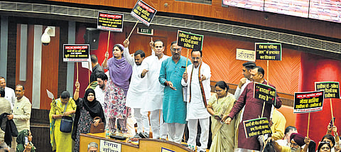 BJP councillors protest inside the MCD House over the death of three civil services aspirants in the Old Rajinder Nagar area on Monday.