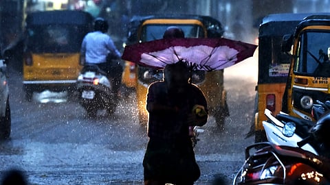 Commuters were caught unawares by downpour in Chennai on Sunday.