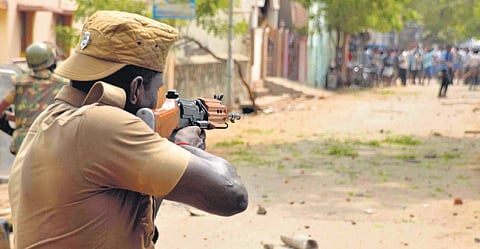 A photograph of police personnel firing at anti-Sterlite protesters in Thoothukudi, in 2018.