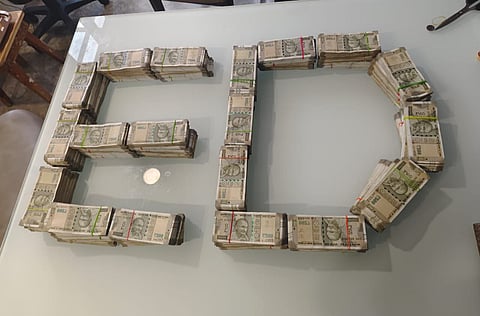 Picture of cash seized by ED from multiple locations in Indore on Monday 