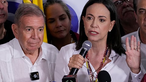 Opposition leader Maria Corina Machado, right, and presidential candidate Edmundo Gonzalez hold a press conference after electoral authorities declared President Nicolas Maduro the winner of the presidential election in Caracas.