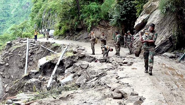 Army personnel carry out rescue and relief operation, in the cloudburst-hit Rampur area of Shimla district.