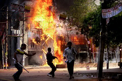 A garment store is reportedly set ablaze by a group of unidentified miscreants in Dhaka on August 4, 2024.