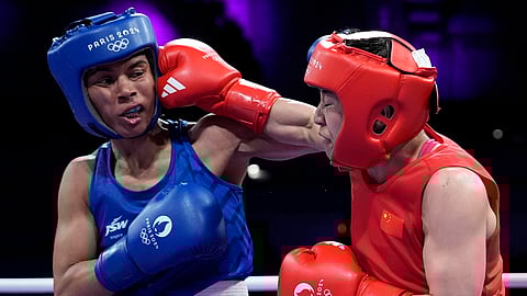 China's Wu Yu, right, fights India's Zareen Nikhat in their women's 50kg preliminary boxing match at the 2024 Summer Olympics, Thursday, Aug. 1, 2024, in Paris, France.