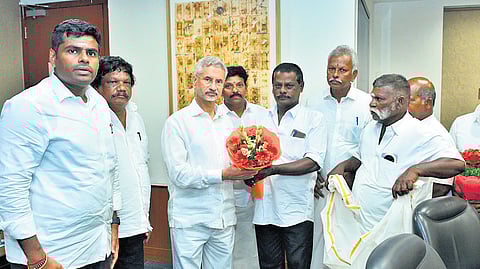 A group of fishermen from Tamil Nadu, led by BJP state unit president K Annamalai, with External Affairs Minister S Jaishankar in Delhi on Monday.