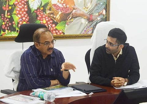 K Kanna Babu, Secretary of Municipal Administration and Urban Development (left)
