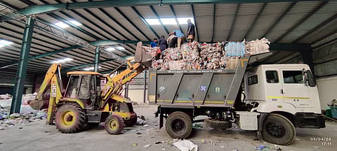 Baled plastic being loaded into lorries at RRC in Viruthampattu