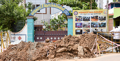 A pit was dug up in front of the corporation middle school on EVR Road as part of the civic body’s UGD work.