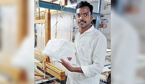 Sircilla weaver produces linen dress for Pawan Kalyan