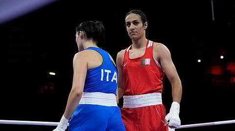 Algeria's Imane Khelif, right, walks beside Italy's Angela Carini after their women's 66kg preliminary boxing match at the 2024 Summer Olympics, Thursday, Aug. 1, 2024, in Paris, France. 