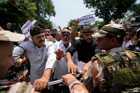 Activists of Congress party shout slogans during a protest marking the fifth anniversary of the abrogation of Article 370, in Jammu, India, Monday, Aug 5, 2024.
